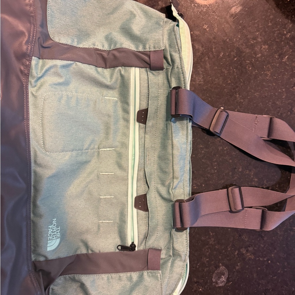 The North Face Gray and Blue Duffel Bag with Durable Design